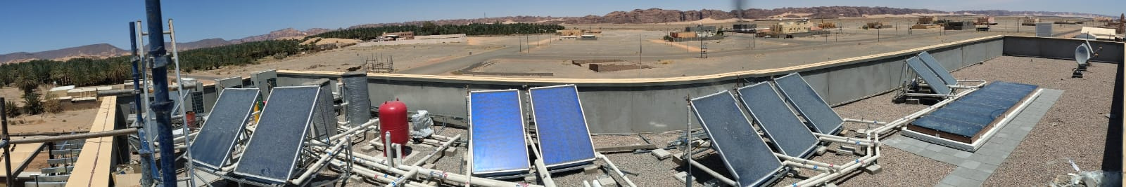 Solar collector array on the roof of Tharba Medical Center